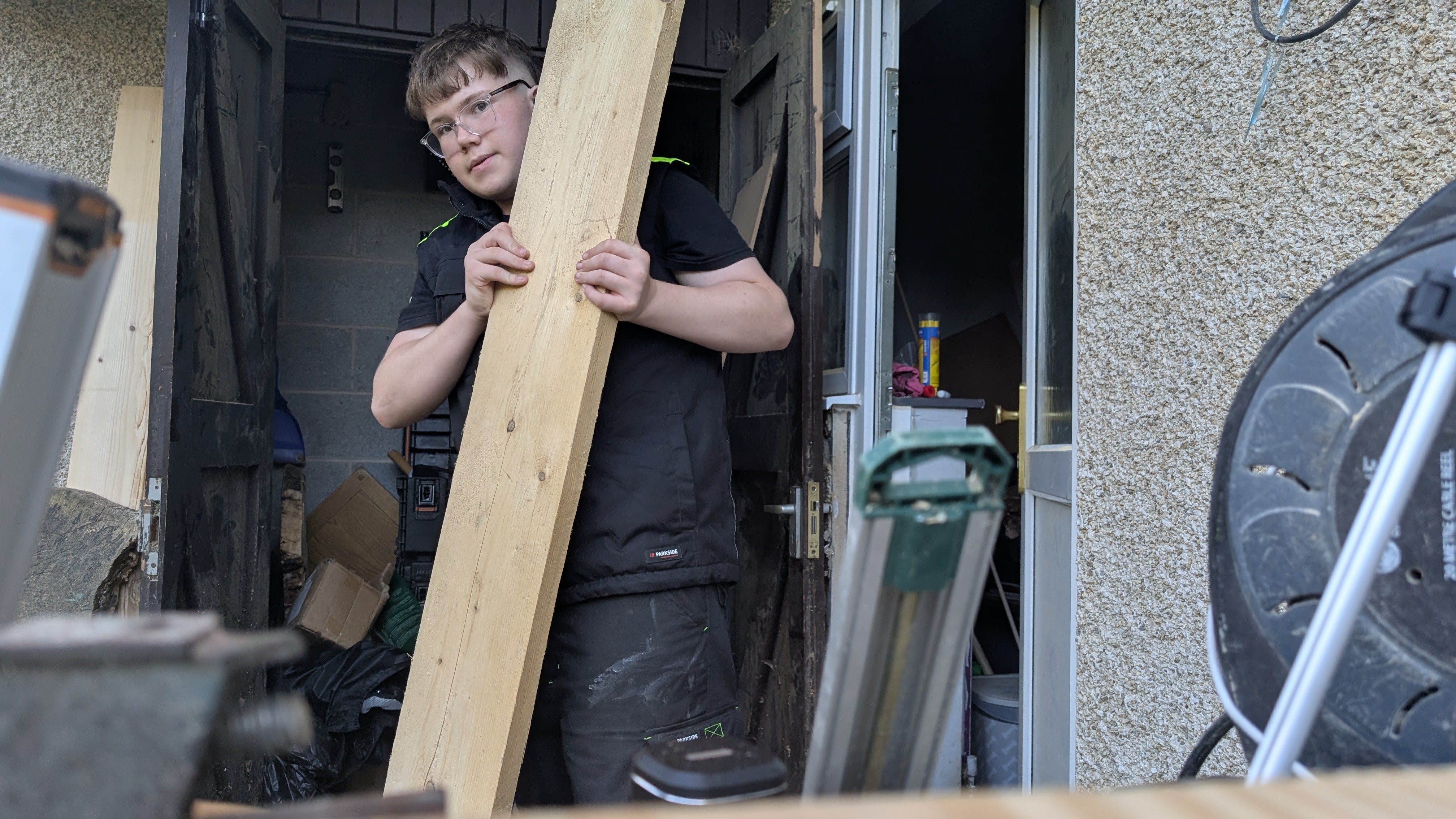 Mason Hughes working in his workshop